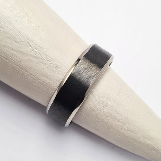 Men's Wedding Band: Black Zirconium with silver zirconium bevels