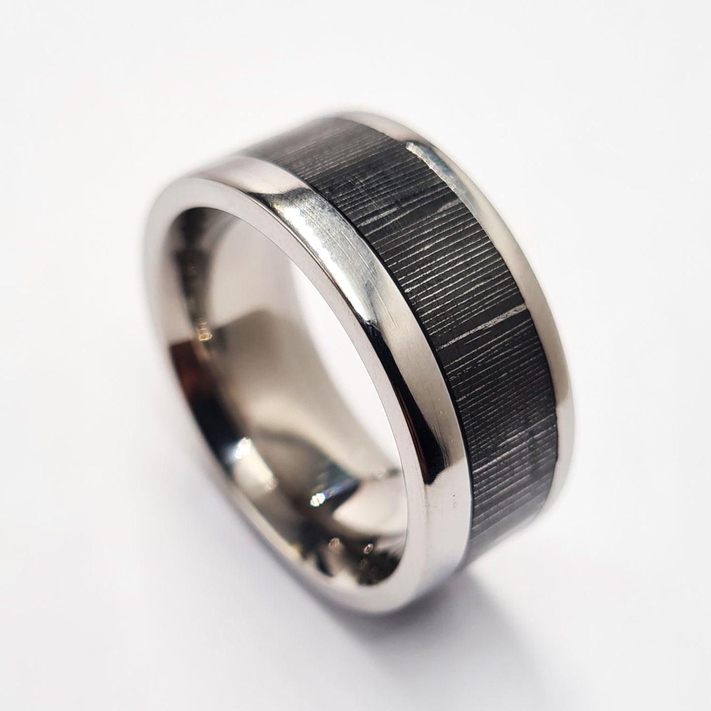 Men's Wedding Band: Titanium with silver infused Carbon Fiber inlay