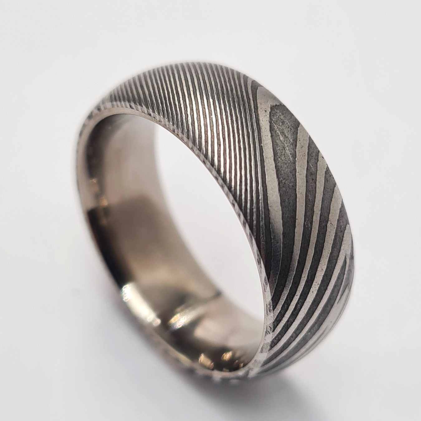 Men's Wedding Band: Carbon Damascus with Titanium sleeve