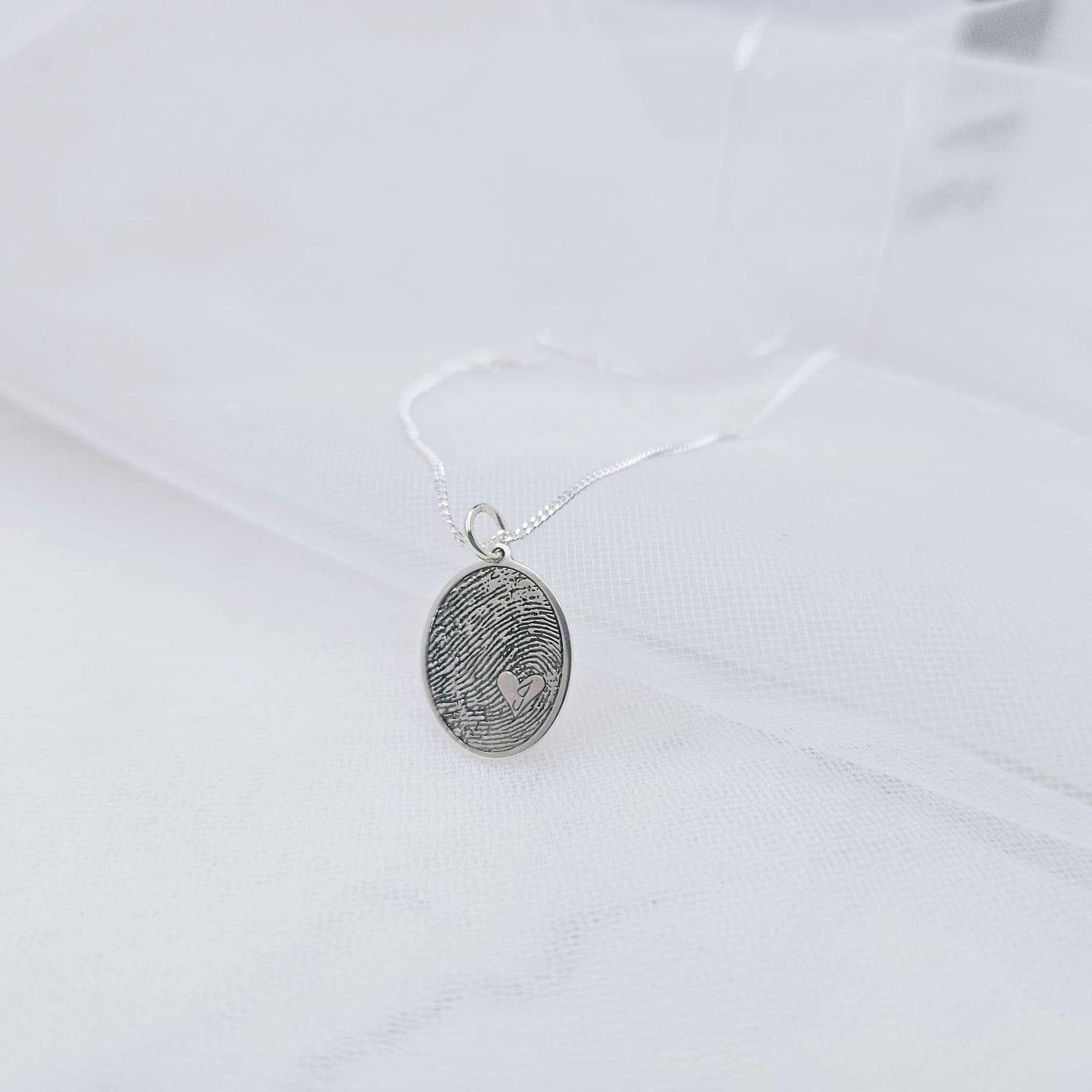 Fingerprint with Initial Pendant